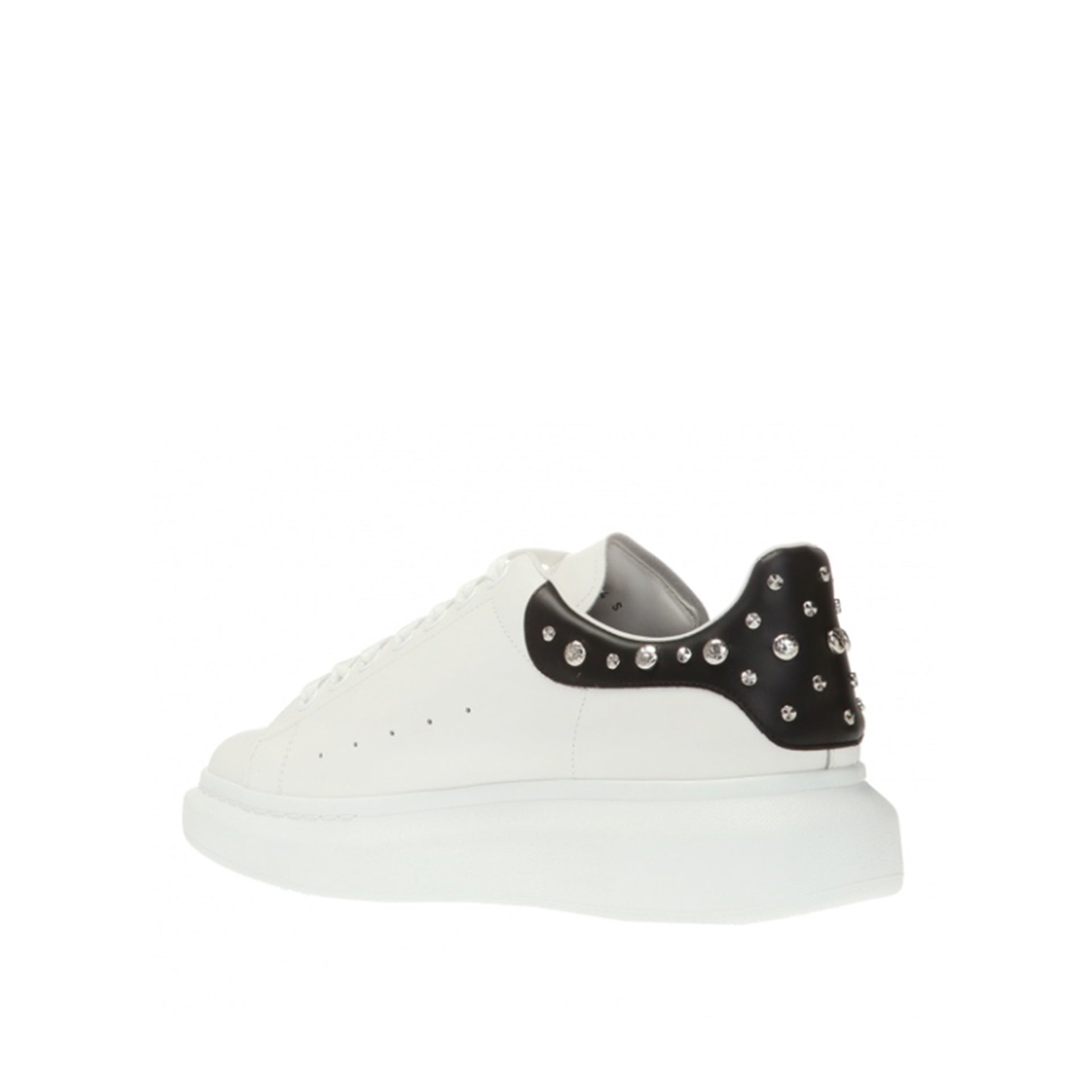 ALEXANDER MCQUEEN  Sneakers in Pelle Borchiata Bianche Alexander McQueen Uomo I Più Venduti