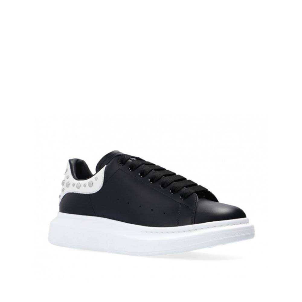 ALEXANDER MCQUEEN  Sneakers Alexander McQueen Nere in Pelle Borchiata Vendite Flash