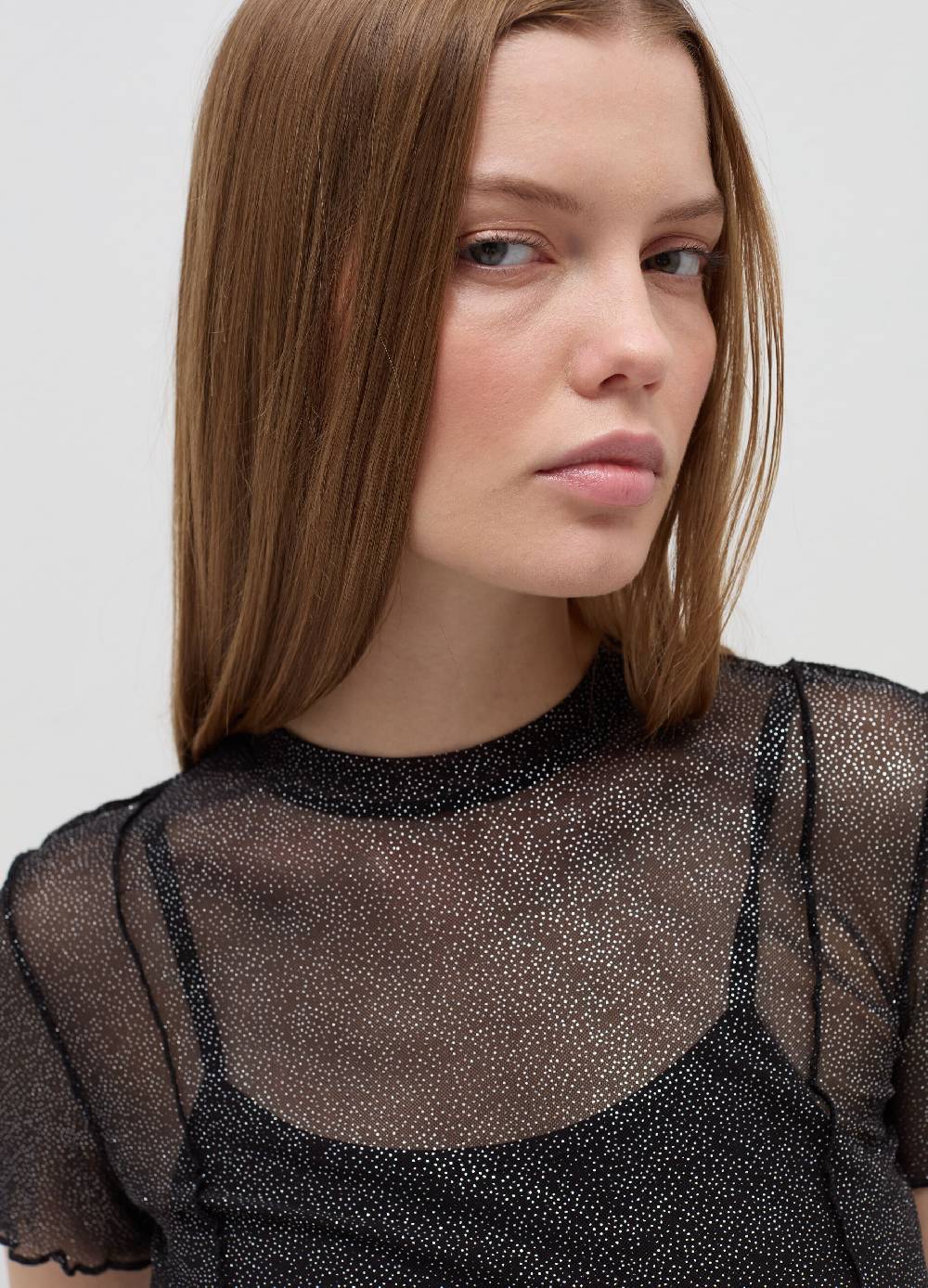 B. ANGEL T-shirt crop in mesh con profili ondulati Nuova