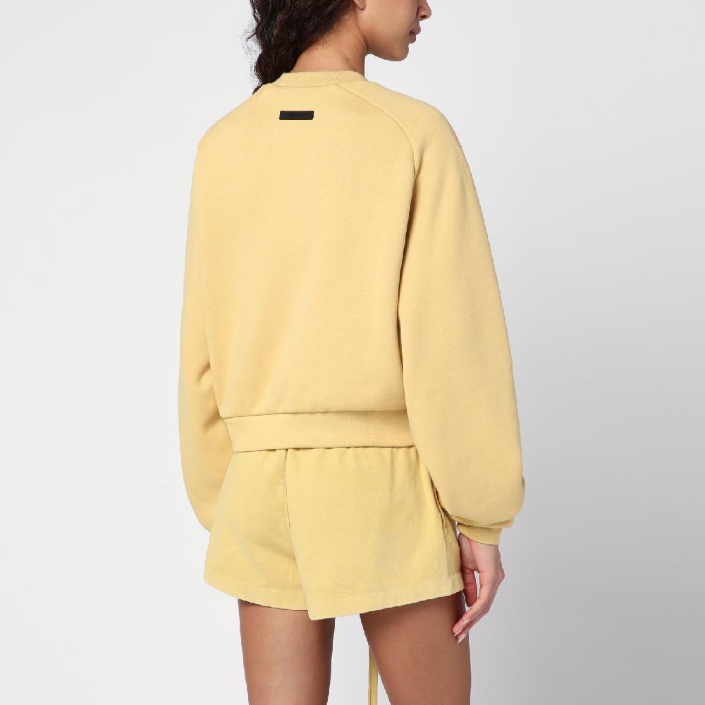 Fear of God Essentials Felpa cropped ambra con logo Vendita Economica