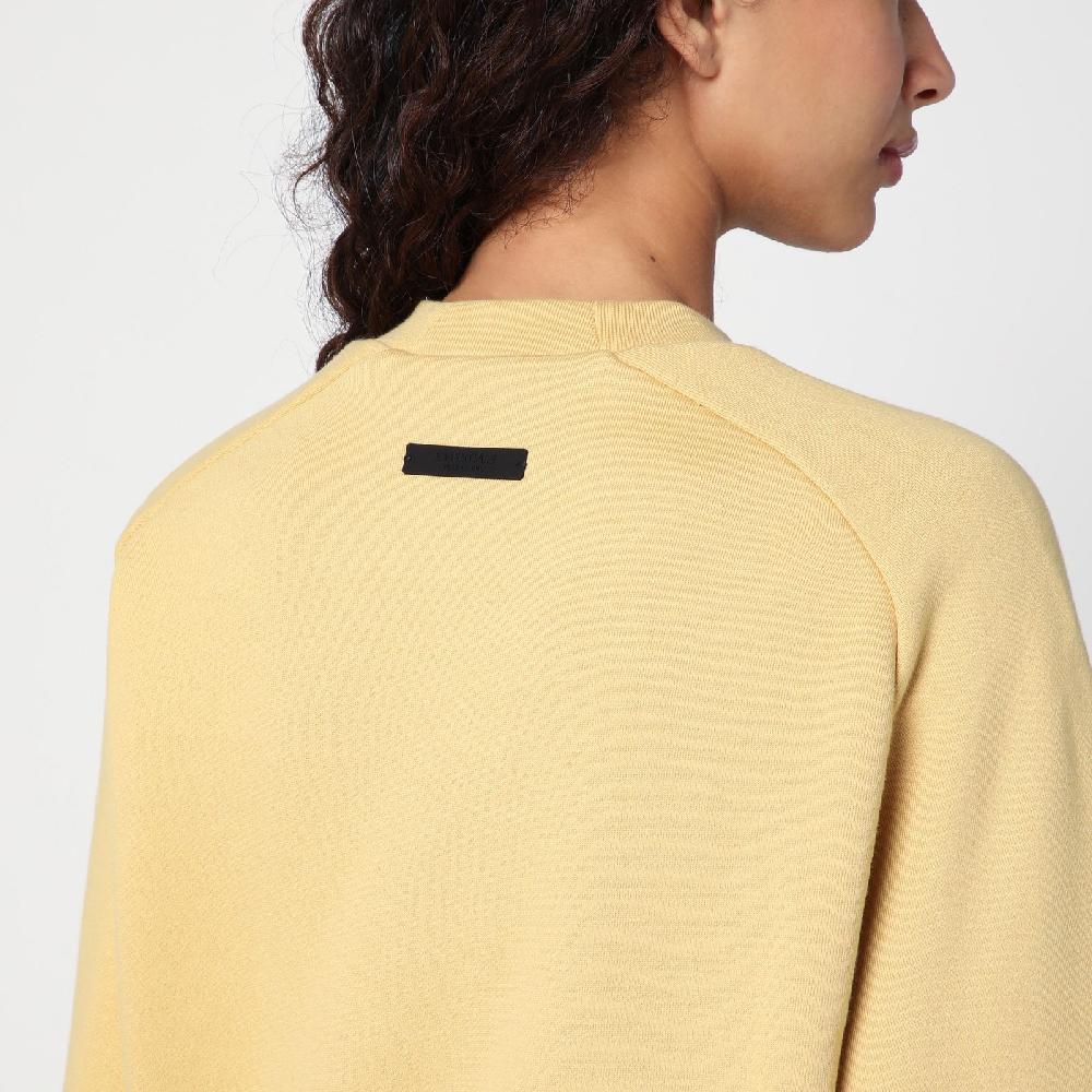 Fear of God Essentials Felpa cropped ambra con logo Vendita Economica