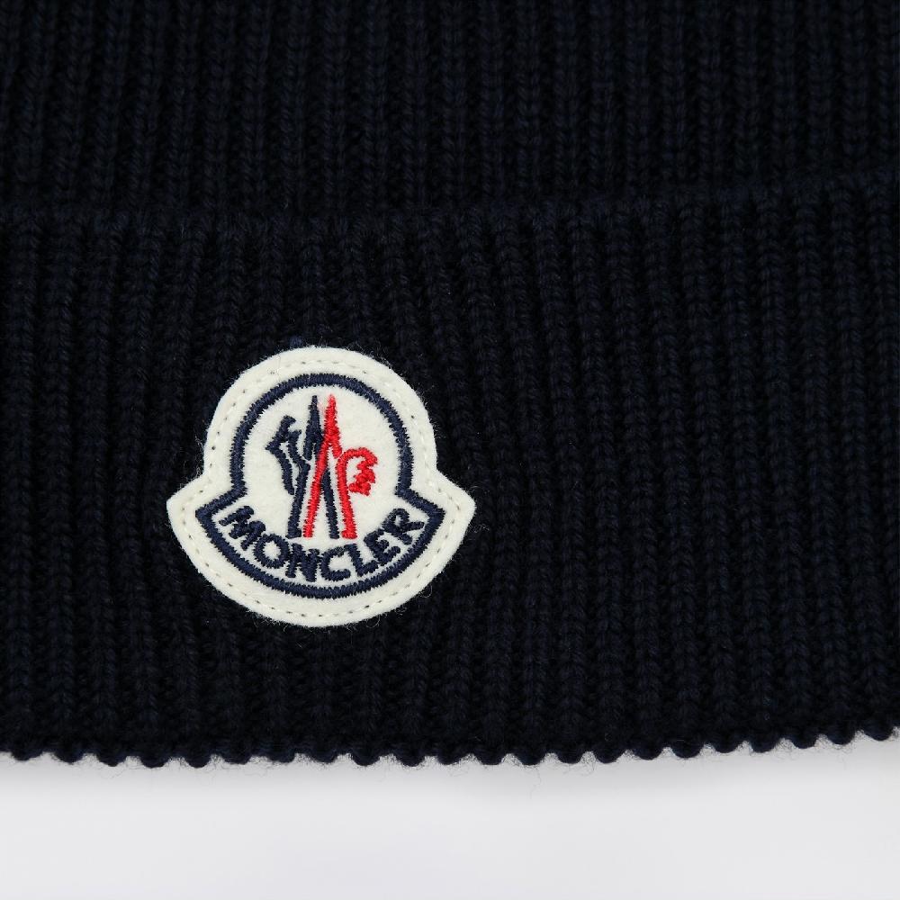 Moncler Cuffia blu in lana con patch logo Presa