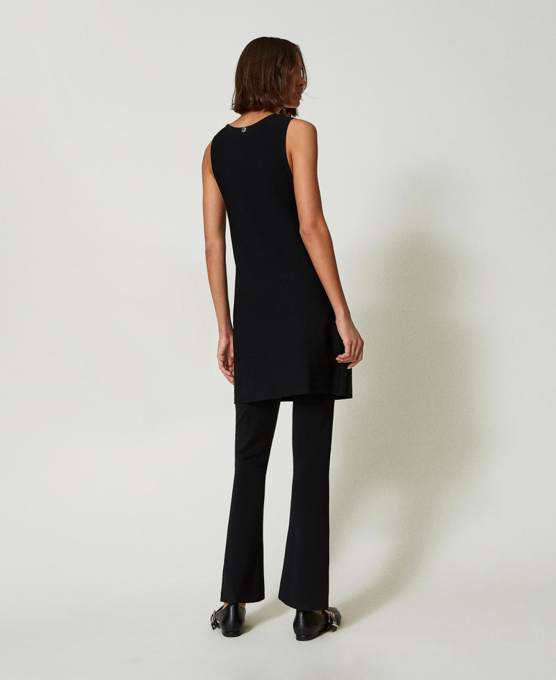 Scee by twin set Pantaloni flare in maglia Sconti questo mese