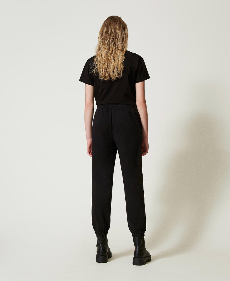 Scee by twin set Pantaloni joggers in felpa con raso Fino al 50% di sconto