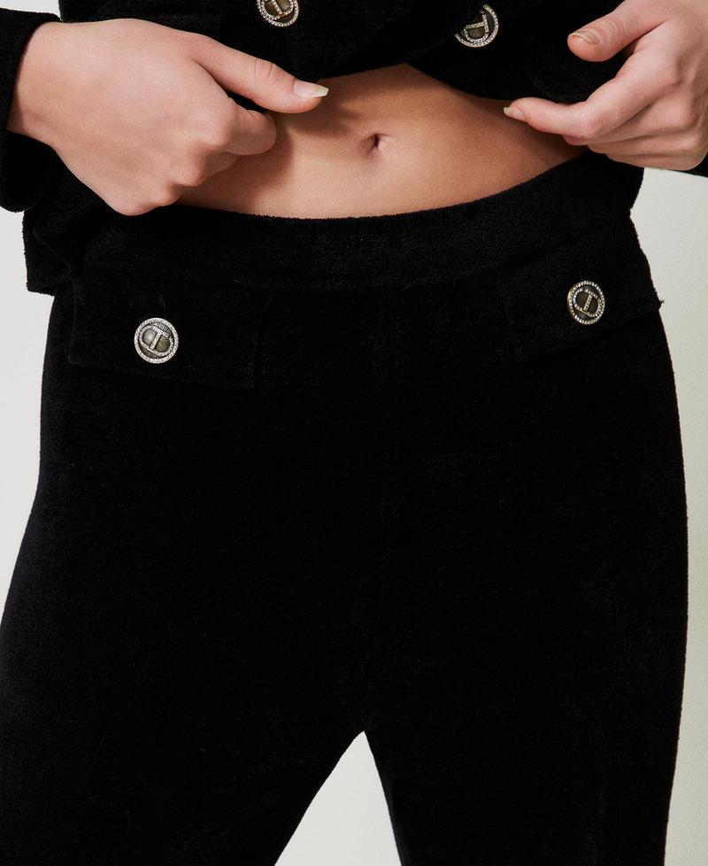 Scee by twin set Pantaloni flare in maglia con bottoni Oval T Promozione Limitata