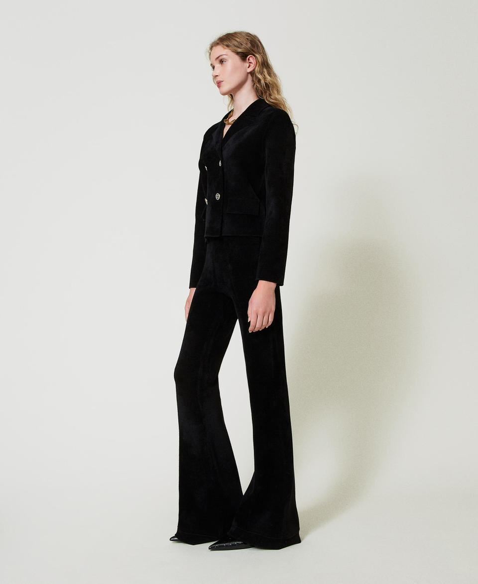 Twin Set Pantaloni flare in maglia con bottoni Oval T Consegna Veloce